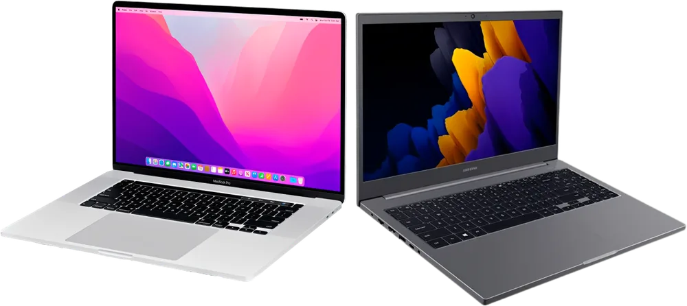 Dois notebooks abertos, um prata e um cinza